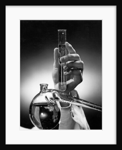 Hand Holding Test Tube by Anonymous
