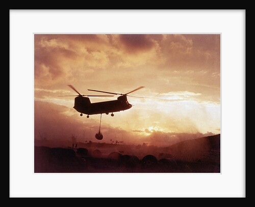 Chinook Helicopter Lifts Ammunition by Anonymous