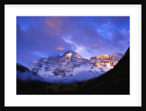 Sunrise on Snow-Covered Mountains by Anonymous