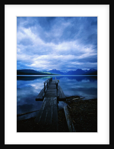 Pier at Lake McDonald Under Clouds by Anonymous