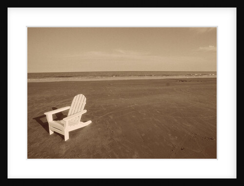 Lone Chair on Empty Beach by Anonymous