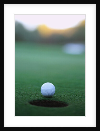 Golf Ball Close to Hole by Anonymous