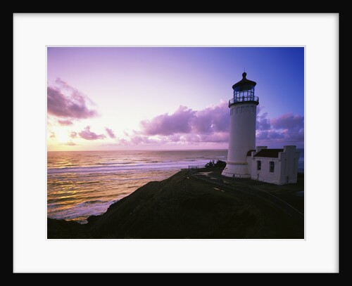 Lighthouse by Beach at Sunset by Anonymous