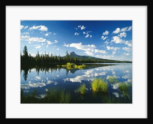 Clouds in Sky Reflected by Mountain Lake by Anonymous