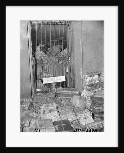 Newspapers Piled High in a Room by Anonymous