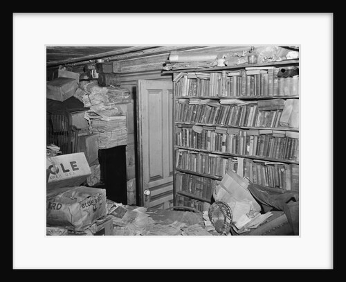 Interior View of a Room Full of Books and Cartons by Anonymous