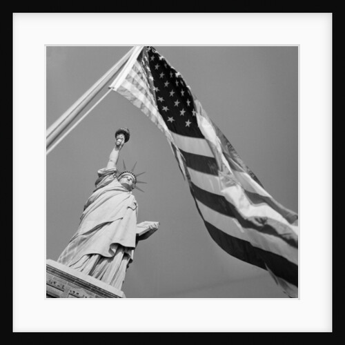 View of Statue of Liberty and American Flag by Anonymous