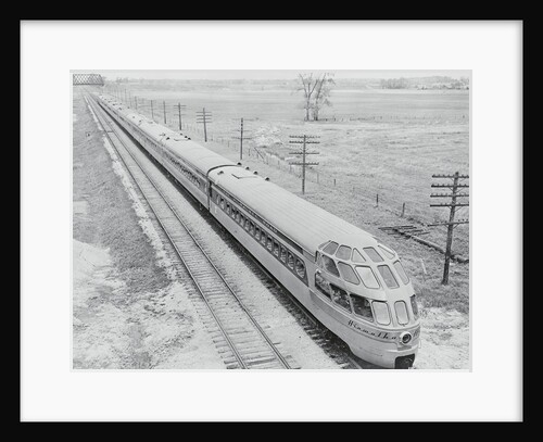 Streamlined Train Cars on Daytime Schedule by Anonymous