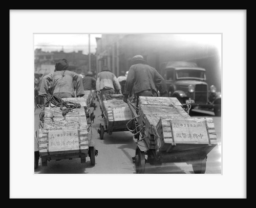 Chinese Men Pulling Heavy Loads of Silver Bullion by Anonymous