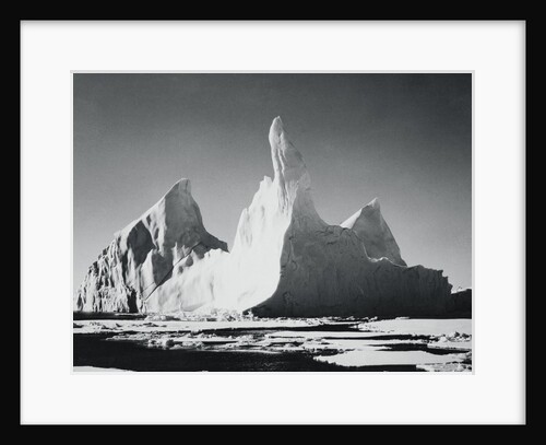 Iceberg Rising From Arctic Waters by Anonymous
