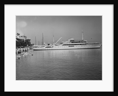 Onasis Yacht Docked Near Shore by Anonymous