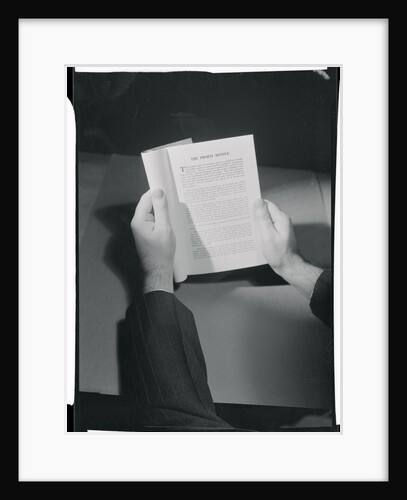 Hands Holding Open Booklet by Anonymous