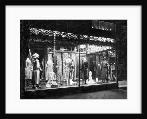 Lighted Window Display of a Dress Shop by Anonymous