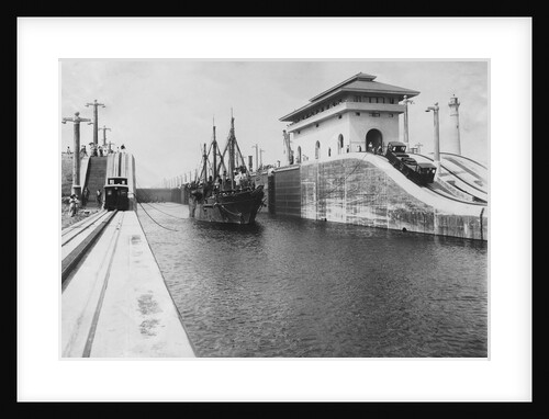 Pulling Tender Through Panama Canal by Anonymous