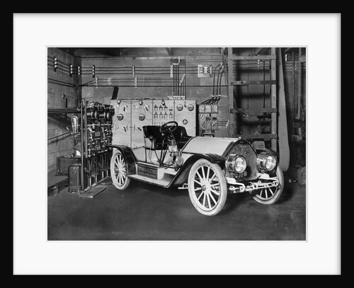 Electric Car at Charging Station by Anonymous