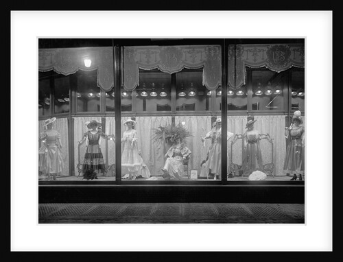 Dress Display in a Store Window by Anonymous