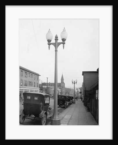 Ornamental Lights Along a Sidewalk by Anonymous