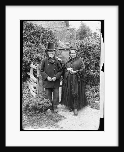 Elderly Couple Standing by Fence by Anonymous