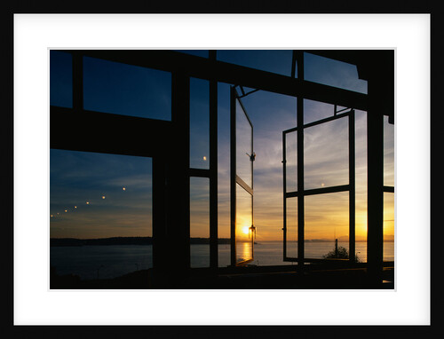 Sunset Reflected on Windows by Anonymous