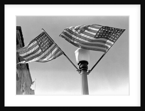 Flags on Lightpost by Anonymous
