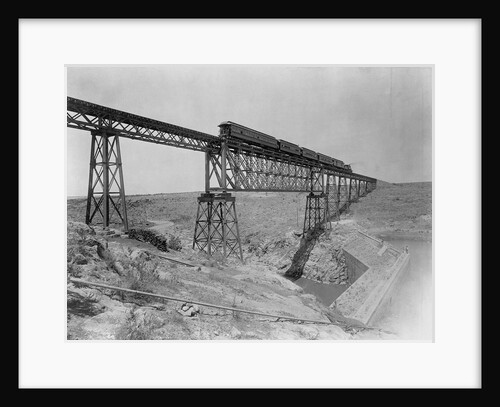 Train Crossing Bridge Over Dam by Anonymous