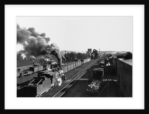 Engine Moving Through a Rail Yard by Anonymous