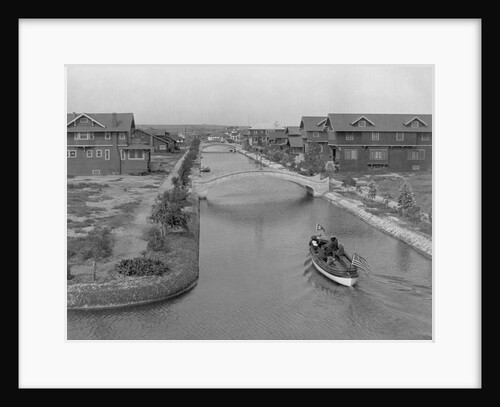 Boat on Aldebaran Canal Passing Houses in Venice, California by Anonymous