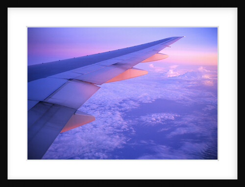 Setting Sun Hitting Airplane Wing by Anonymous