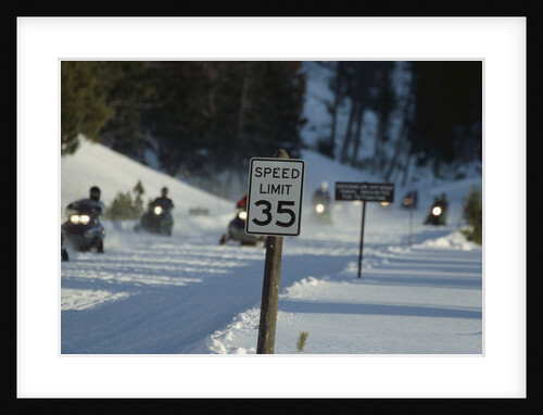 Speed Limit Sign and Snowmobiles by Anonymous