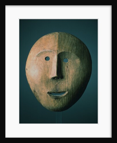 An Eskimo Wood Face Mask by Anonymous
