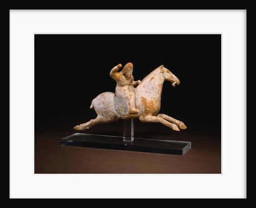 A Rare Painted Pottery Figure of a Female Polo Player by Anonymous