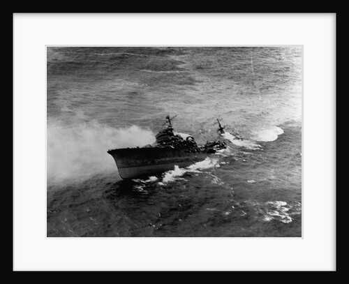 A Japanese cruiser (Katori Class) sinking off the coast of French Indo-China after attack by SB2c's from the USS Hancock. January 12, 1945 by Anonymous