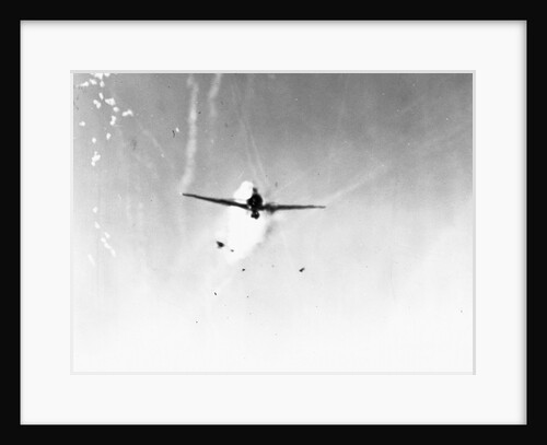 Japanese plane (Zeke of Oscar) in Lingayen Gulf, diving on the USS New Mexico (BB 40) from astern. Plane struck the port side of the bridge three seconds later. January 6, 1945 by Anonymous