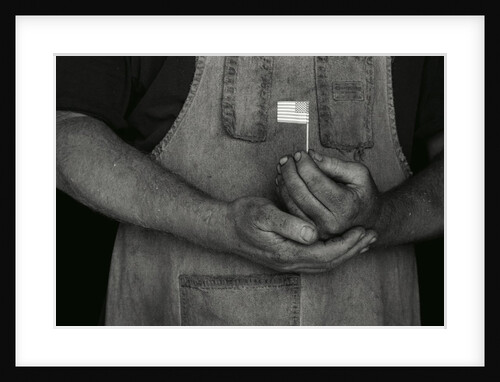 Man Holding Small American Flag by Anonymous