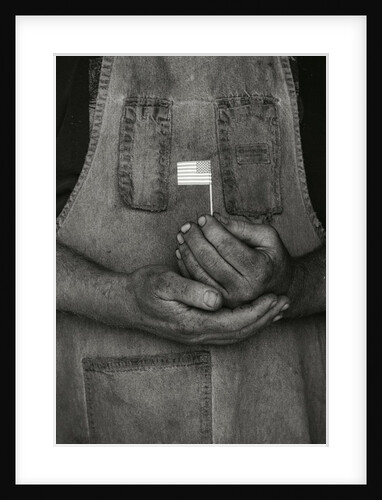 Man Holding Small American Flag by Anonymous