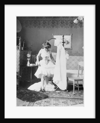 Victorian Woman Undressing in the Bath by Anonymous