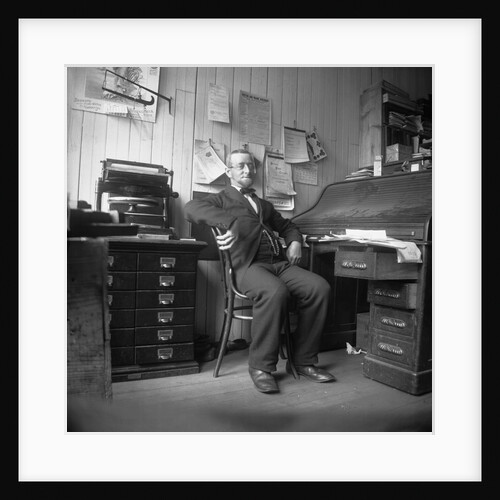 Man Sitting in His Office by Anonymous