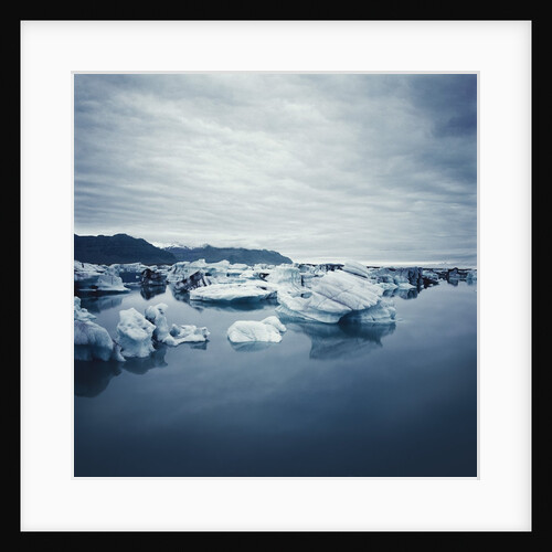 Bergy Bits Under Cloudy Sky by Anonymous