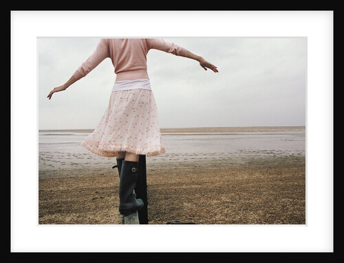 Woman Balancing on a Breakwater by Anonymous