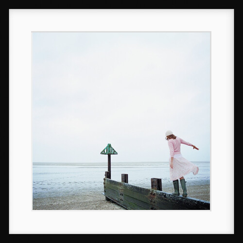Woman Balancing on a Breakwater by Anonymous