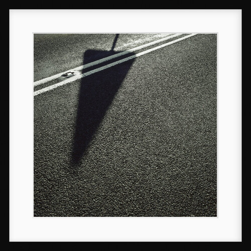 Shadow of Sign on Road by Anonymous