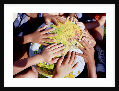 Children's Hands on Inflatable Globe by Anonymous