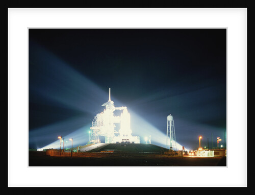 Space Shuttle Illuminated at Night by Anonymous