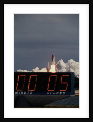 Space Shuttle Discovery Lifting Off and Countdown Clock by Anonymous