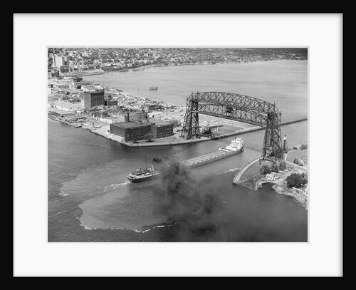 Cargo Boat Passing Under Bridge by Anonymous