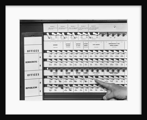 Hand Pushing Lever in Voting Booth by Anonymous
