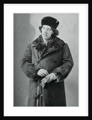Portrait of Oscar Wilde Posing in Overcoat and Hat by Anonymous