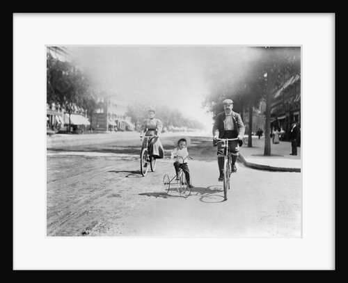 Family Riding Bikes by Anonymous