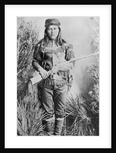 Peaches Holding Rifle by Anonymous