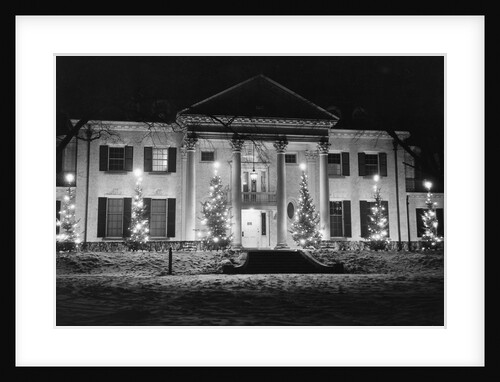 House in Winter With Christmas Lights by Anonymous